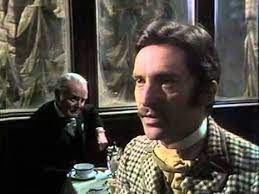 Au premier plan, Bassanio ; à l'arrière plan, Antonio (vidéo du National Teater)